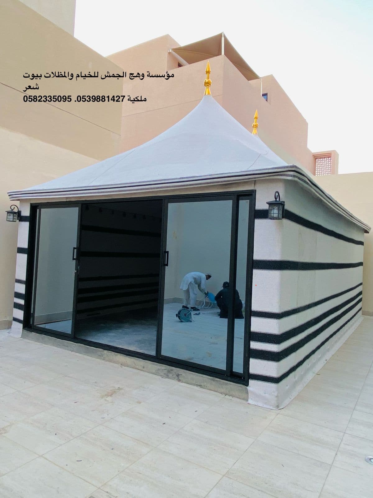 Professional tent installation team at Khiyam baitshaar